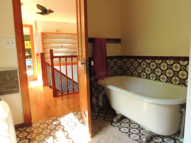 Clara and Jane's room is on the other side of the stairs, Ivy's room is a sharp right just outside the bathroom door.