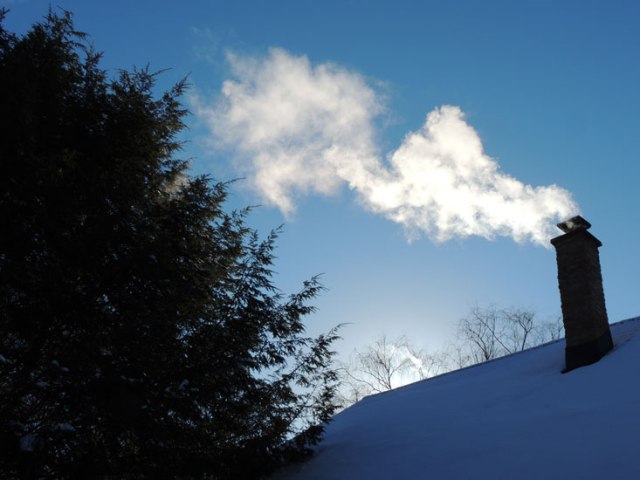 winter sky and chimney smoke