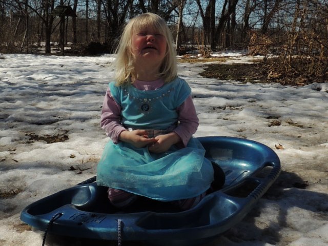 Jane crying on sled