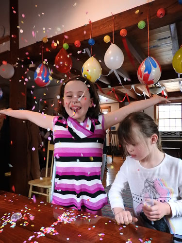 Ivy throwing confetti 