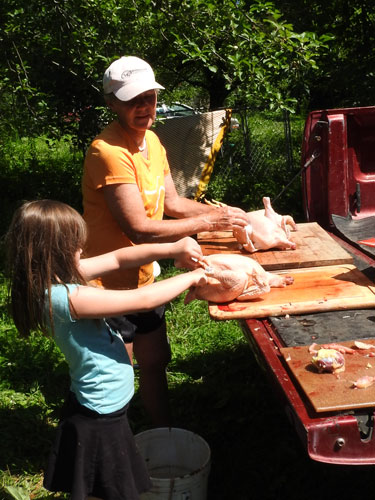 Grandma Mary and Clara chicken butchering