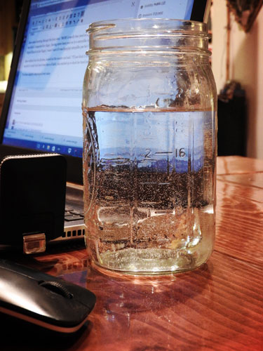 water glass and computer
