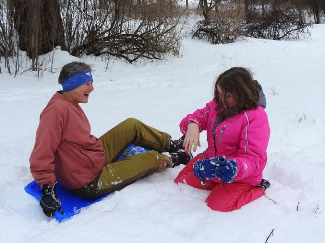 Grandma Mary and Ivy sledding